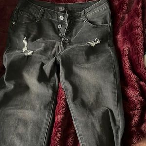 Size 9 skinny fit frayed bottom jeans by Risen. 32in inseam.